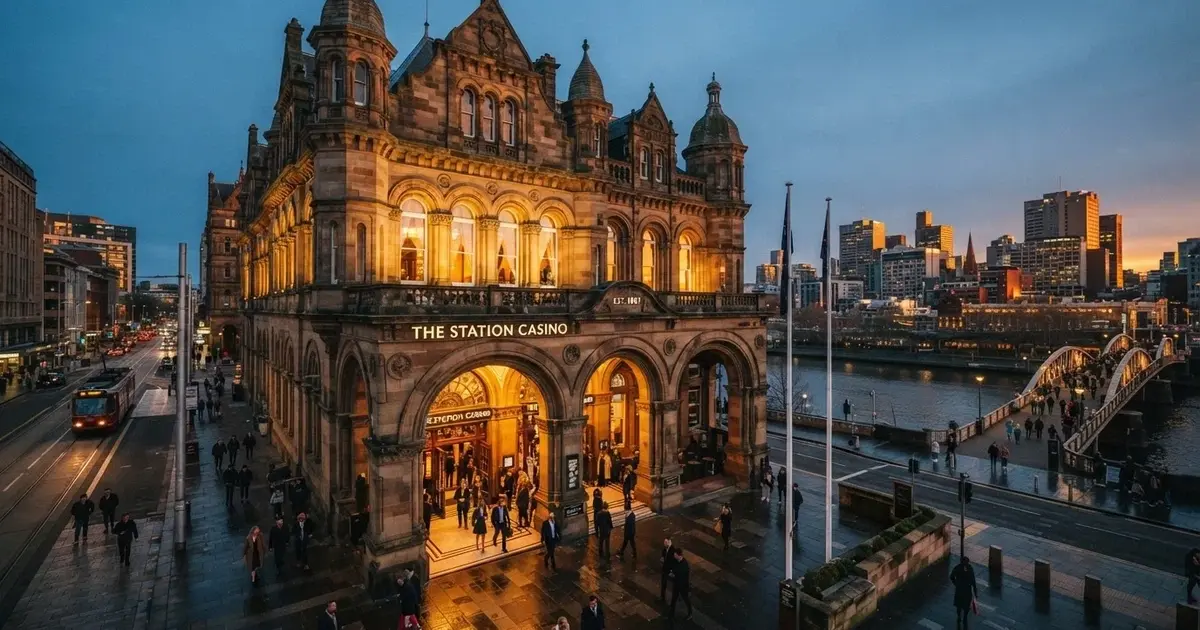 The heritage sandstone facade of SkyCity Adelaide on North Terrace at dusk, housed in the former Adelaide Railway Station